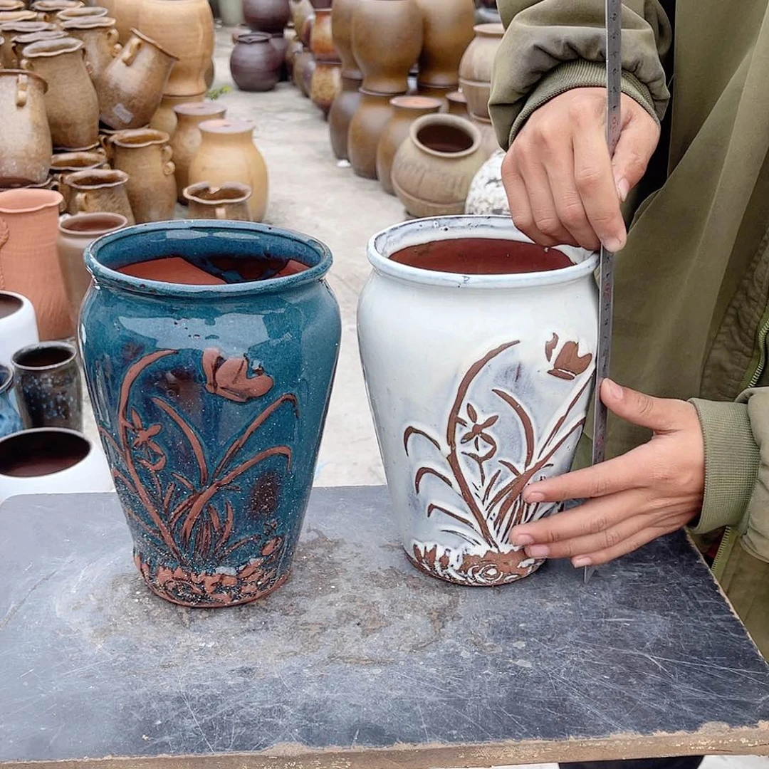 紫砂花盆高度22口径14。