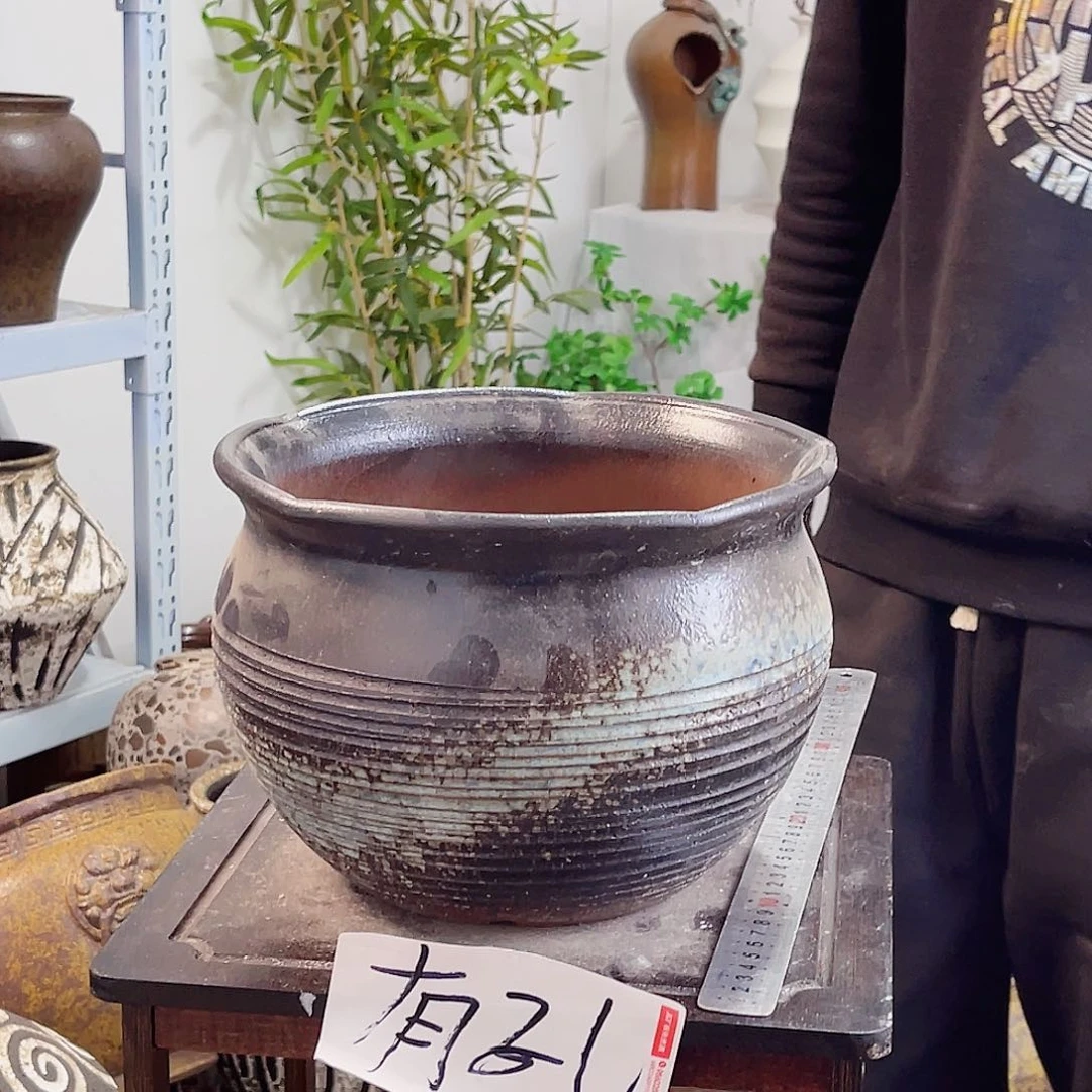 紫砂花盆高度18口径25。