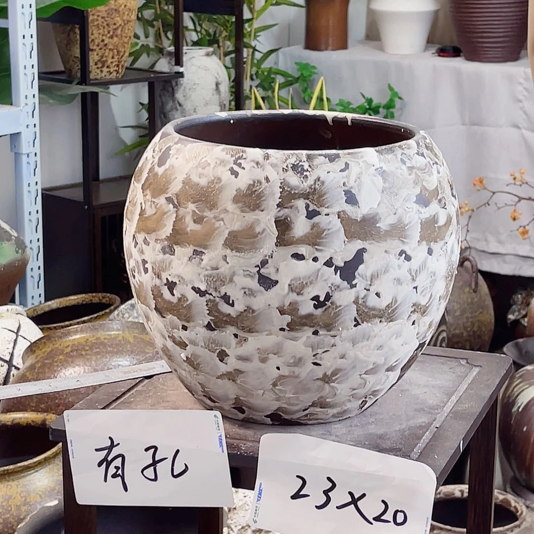 紫砂花盆高度23口径20。