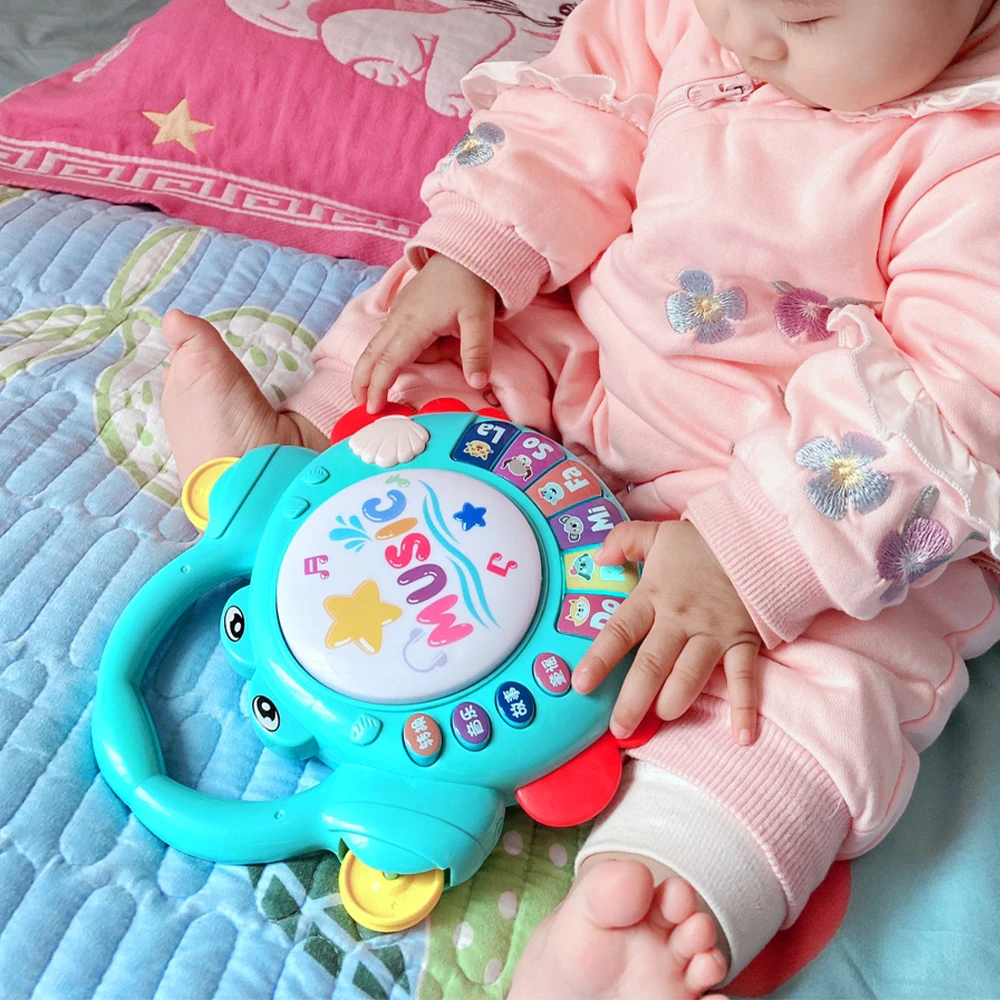 婴儿手拍鼓新生幼儿玩具6-12个月早教益智训练抓握可啃咬牙胶卡通