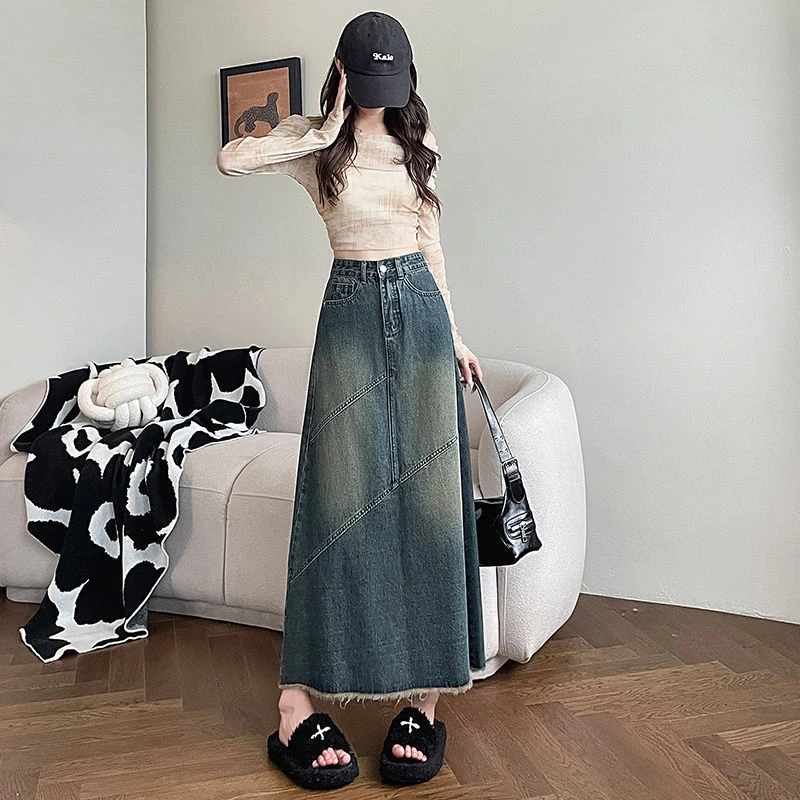复古毛边拼接高腰牛仔裙2025春季新款遮胯显瘦开叉设计感中长款裙