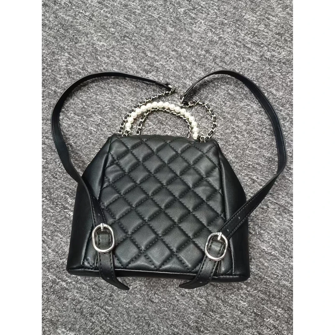 姝宴真皮女包珍珠双肩黑色