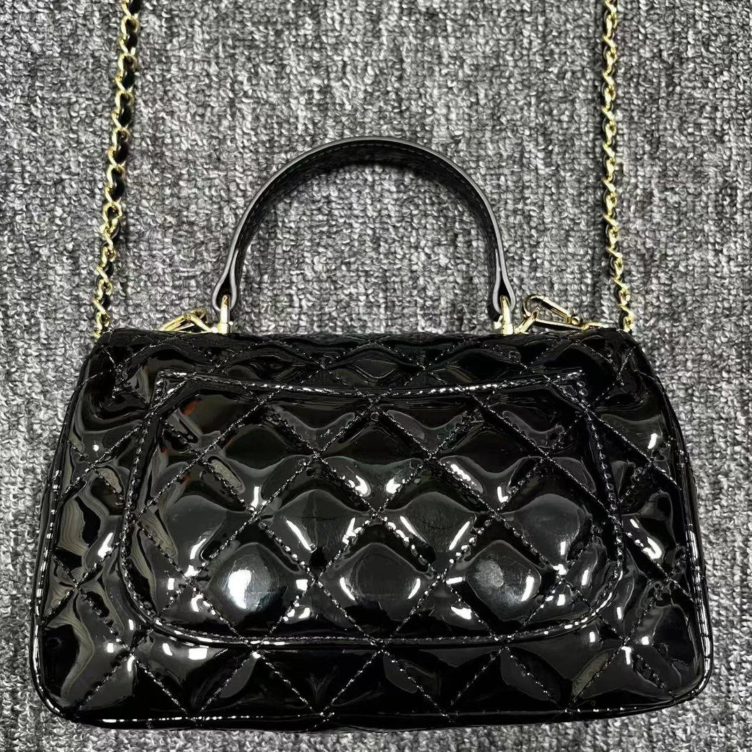 姝宴真皮女包手提胖黑色