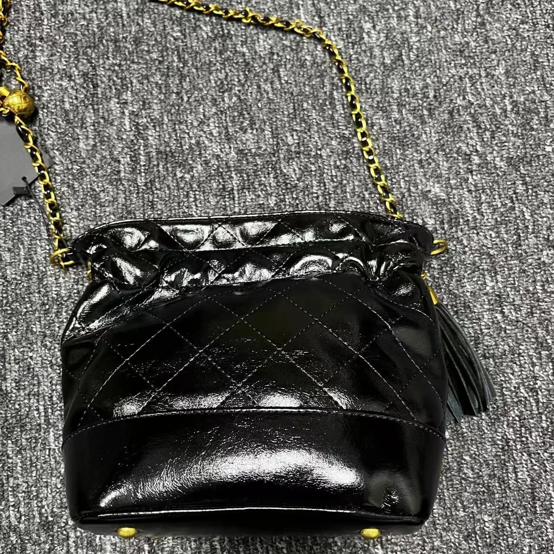 姝宴私人订制手工真皮女包TA0323黑色桶17cm流苏