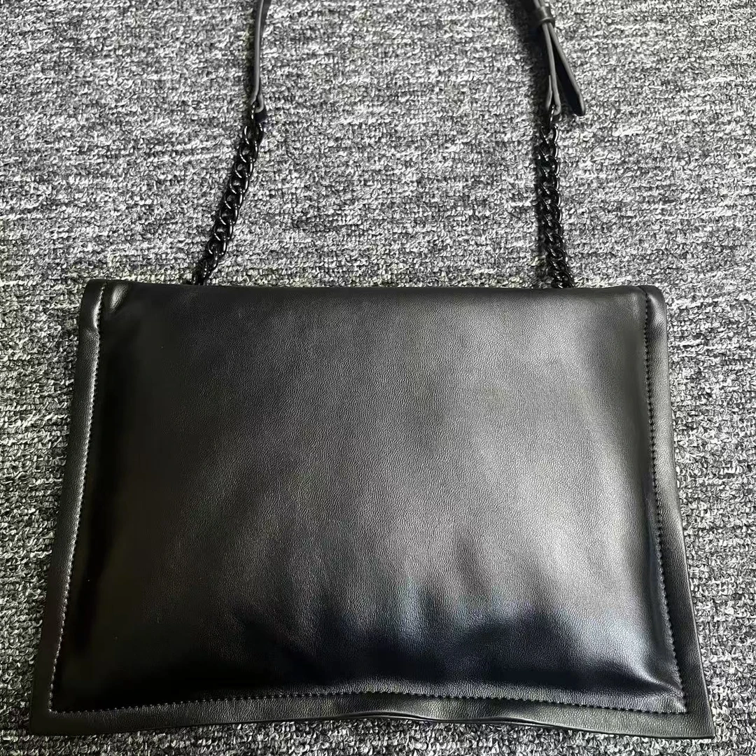 姝宴真皮女包软云朵黑色