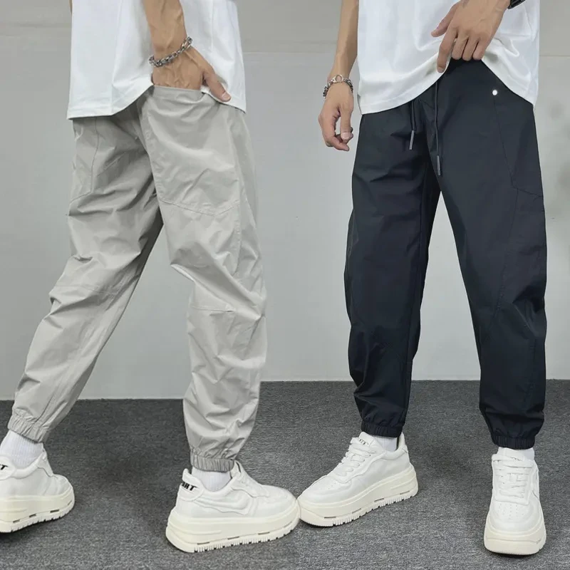 夏季薄款打孔网眼弯刀速干九分裤男潮流宽松哈伦束脚裤纯色运动裤