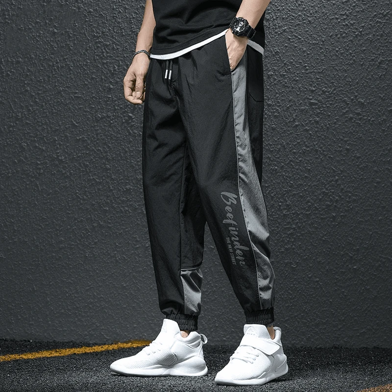 罗蒙高端夏季新款速干休闲裤男士潮牌宽松男裤冰丝运动裤子哈伦裤