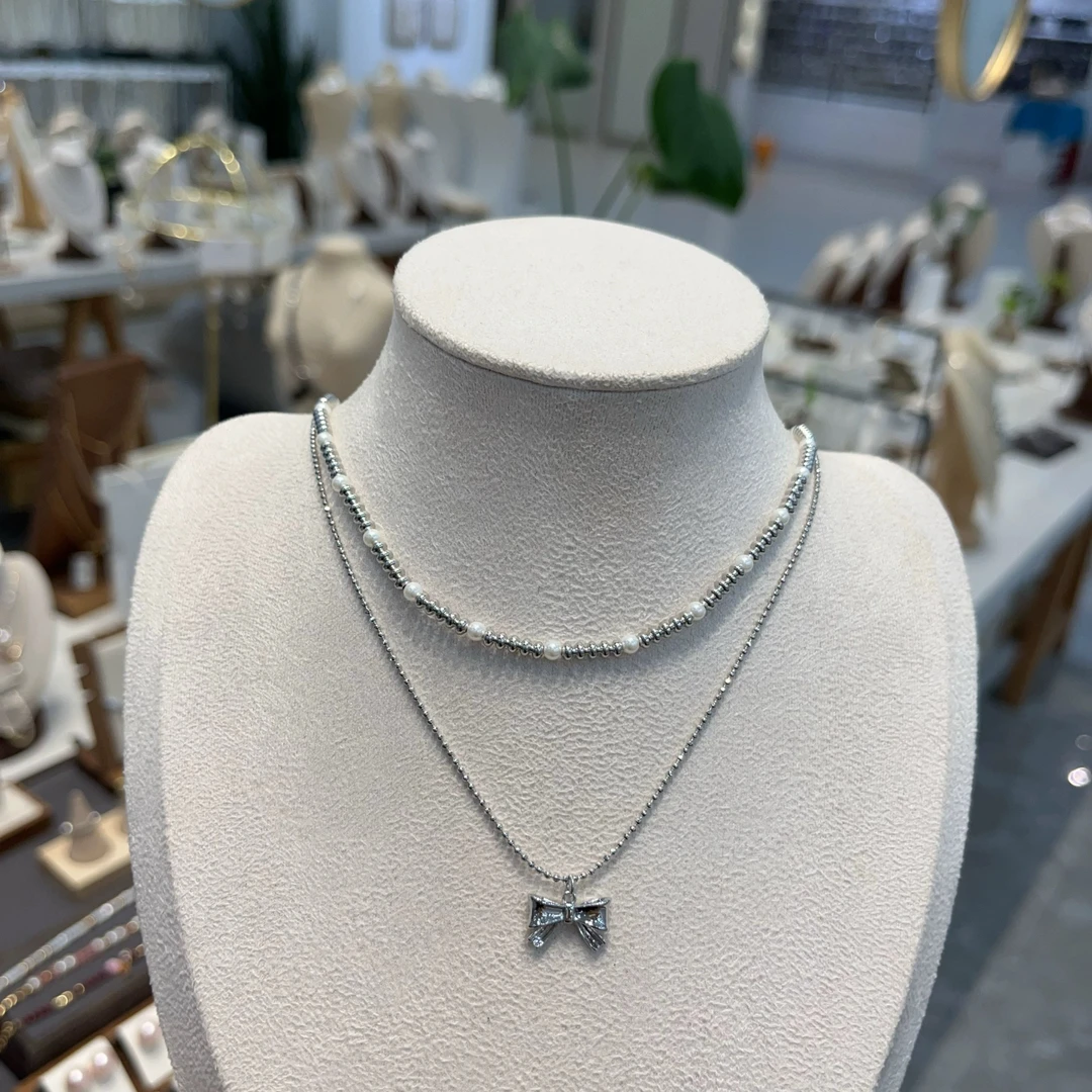 铜合金仿珍珠项链 蝴蝶结新品很美