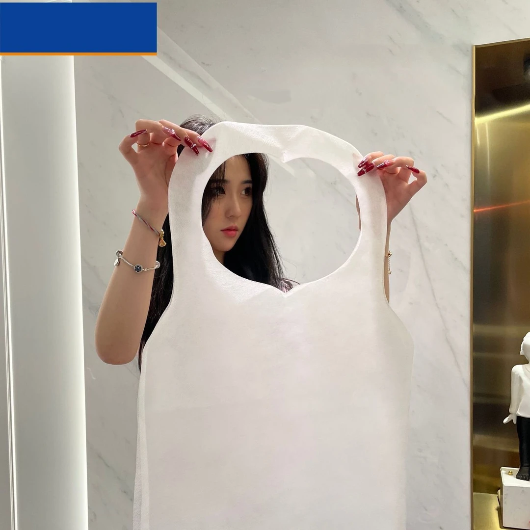 一次性围裙成人兜餐饮吃龙虾火锅烤肉家用防油污PP竹纤维通用围裙