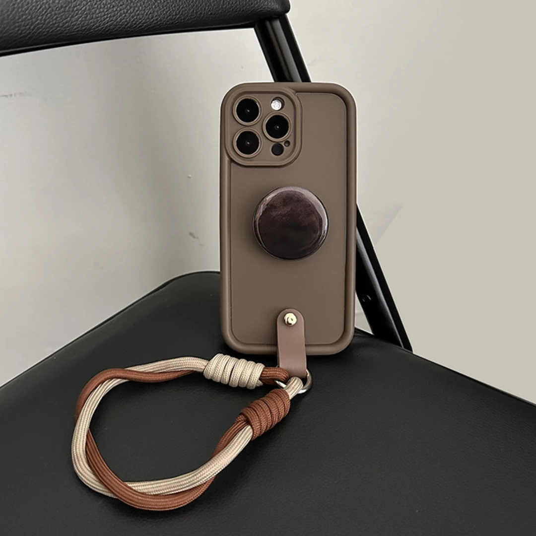 秋冬美拉德咖色手绳iPhone14promax手机壳苹果15支架13防摔12女11