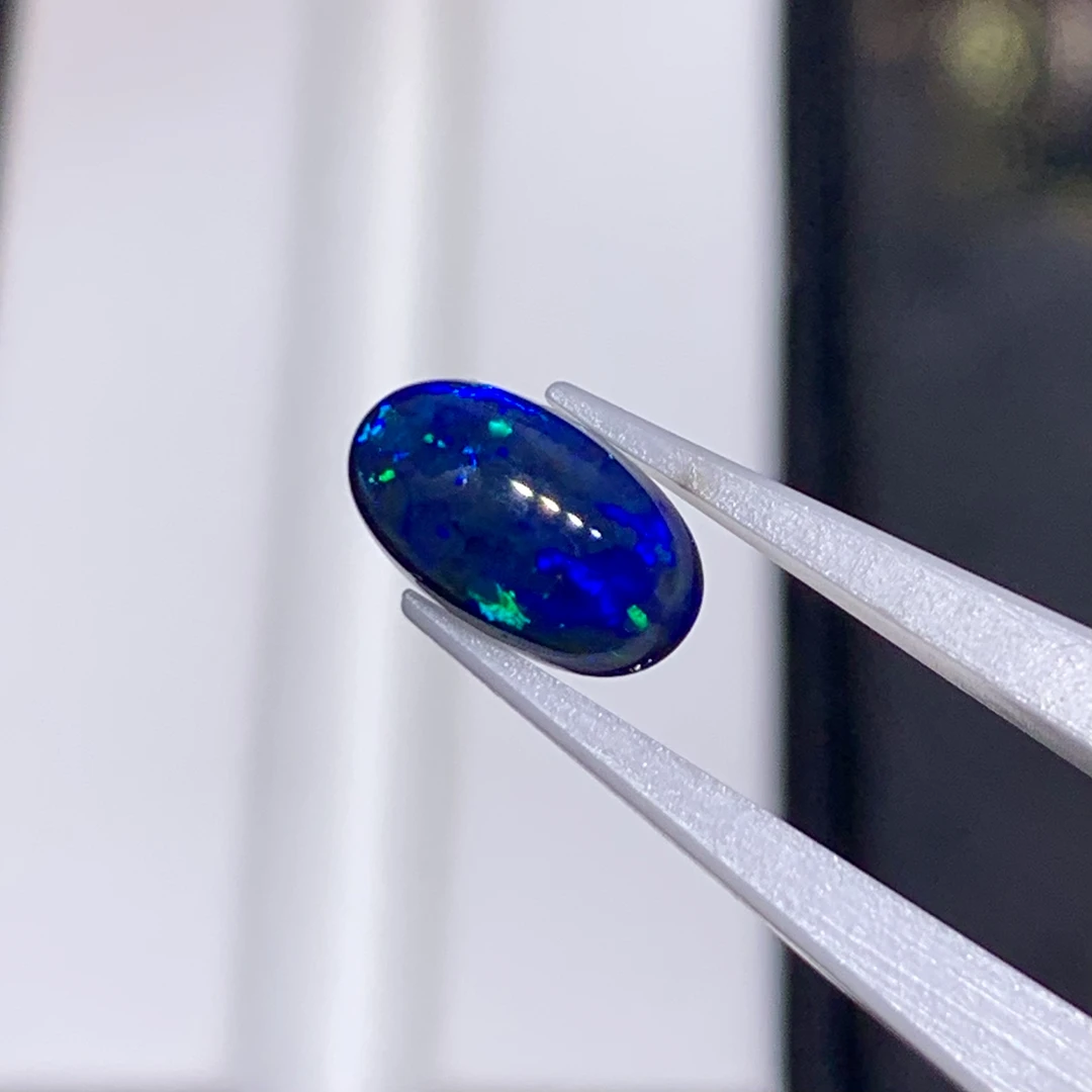 1.295克拉天然澳大利亚欧泊裸石满火黑欧泊5.4*9.1毫米