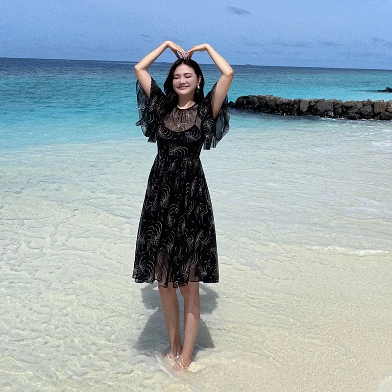 【琳媚】黑色时尚温柔妩媚气质烟花图案印花收腰显瘦连衣裙女