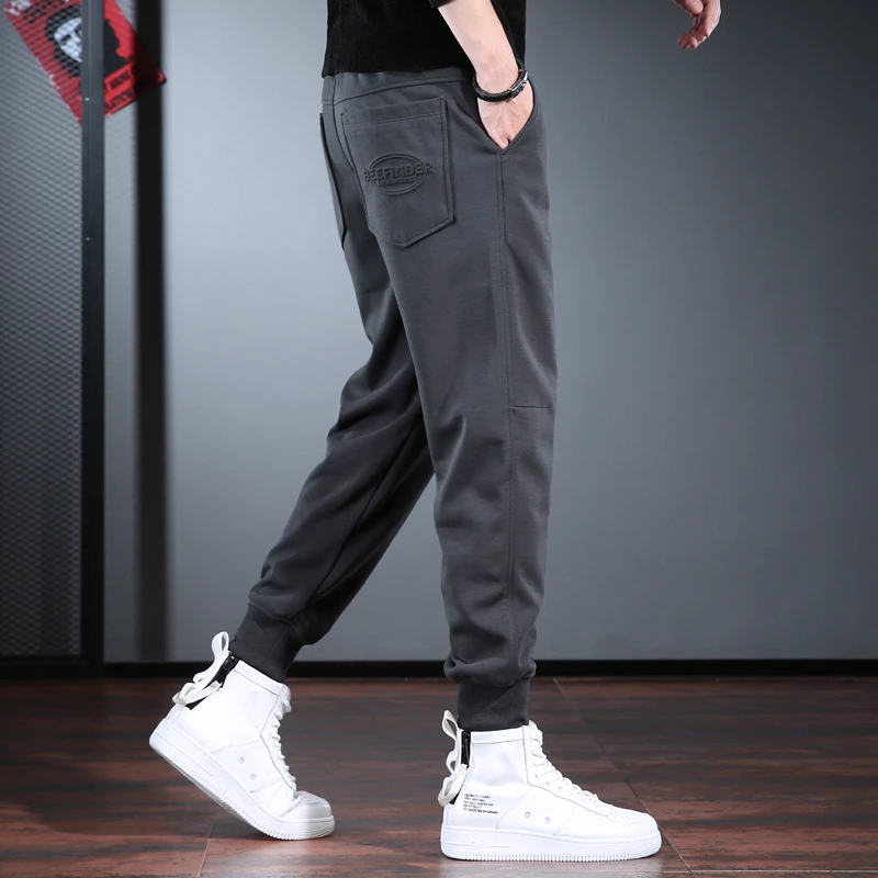 高端男士体闲裤宽松潮牌加绒加厚运动束脚裤秋冬季简约欧洲站卫裤