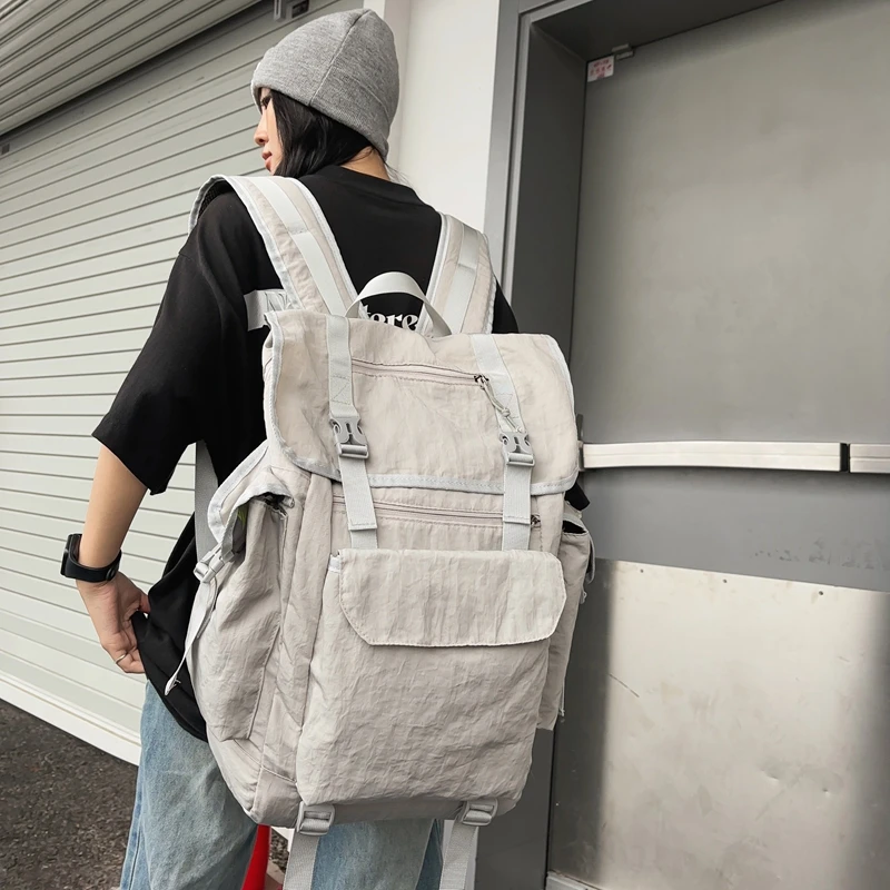 大容量双肩包男生潮流轻便运动旅行背包女高中生简约大学生包出行