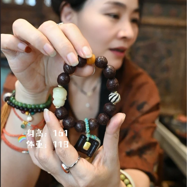 非金属木质手链 茶语-凤眼木质手串