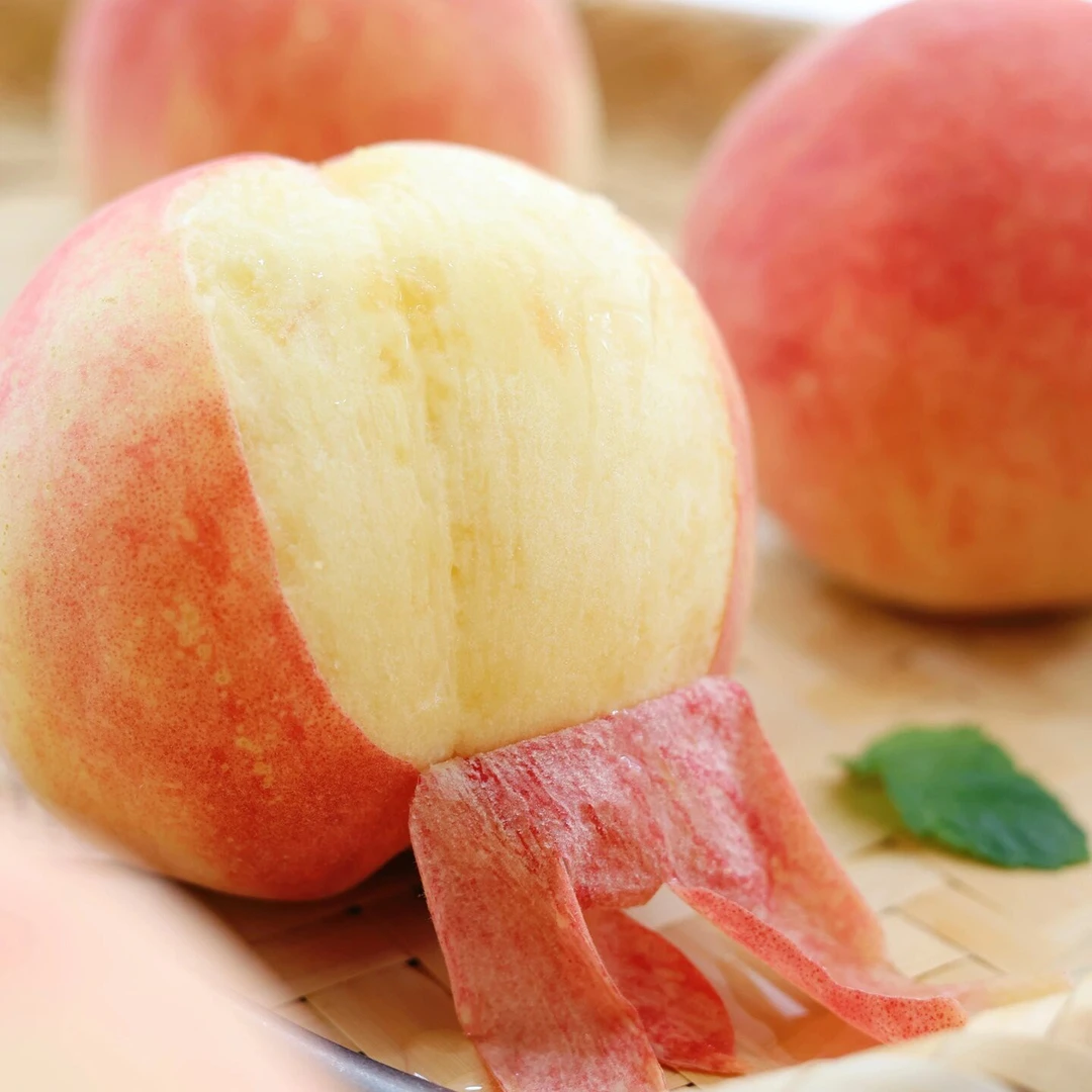 南汇蜜露桃高品质水蜜桃新鲜多汁甜蜜皮薄