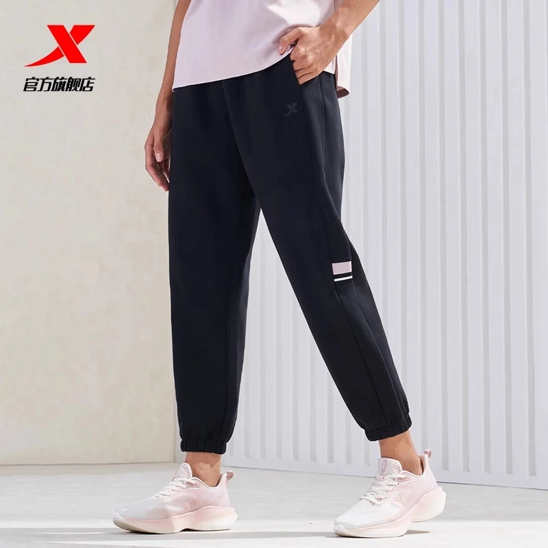 特步塑型科技丨运动裤女春秋新款束脚女子针织九分裤休闲裤