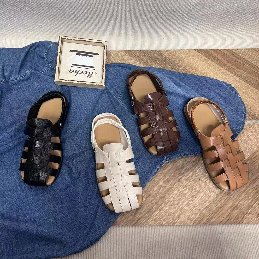 聚吉地2024新款头层牛皮镂空包头百搭夏季时尚圆头软底罗马凉鞋