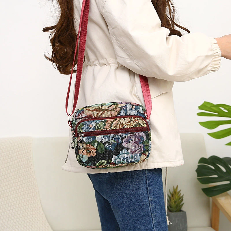 单肩包斜挎包手机包女包妈妈包新款花布中老年休闲百搭生意收钱包