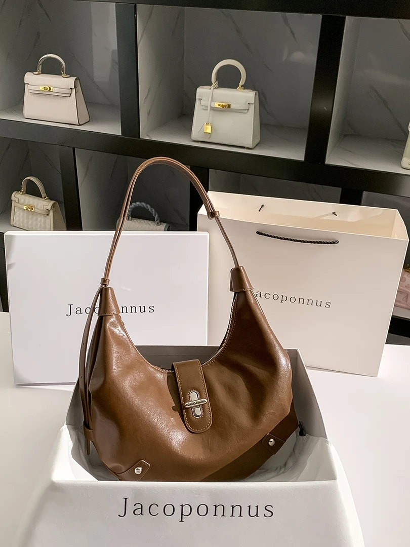 【设计师款】雅丹风2024新款潮通勤百搭腋下包轻奢大容量小众牛角包