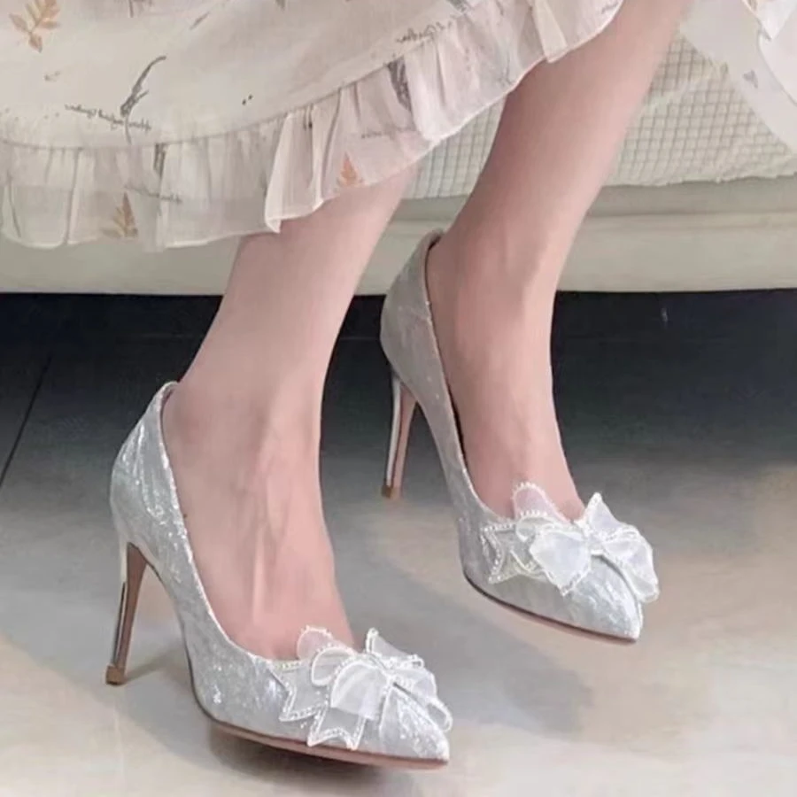 法式水晶鞋2024春秋新款银色婚鞋水钻蝴蝶结尖头高跟鞋女细跟单鞋