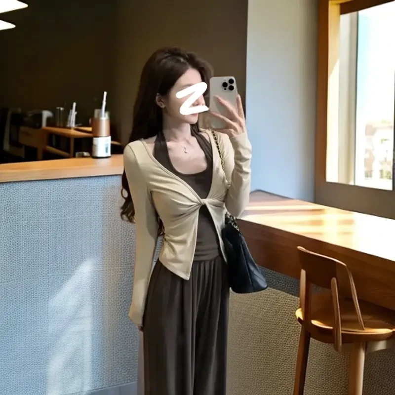 2025秋季新款时尚显瘦气质拼接假两件上衣小众设计感修身打底衫