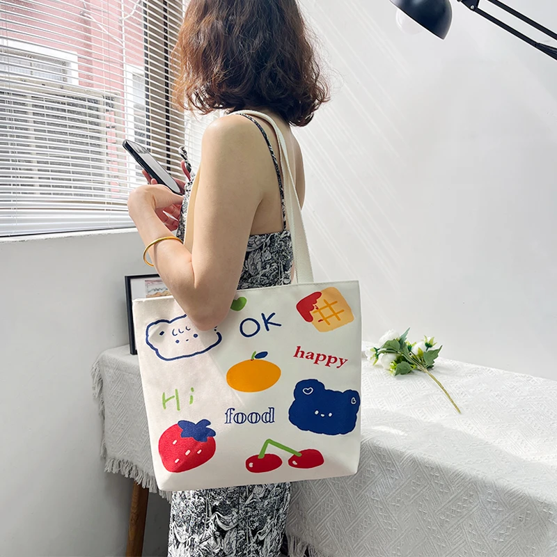 2024水果小熊春夏季休闲百搭网红帆布包斜挎包大容量单肩饭盒包