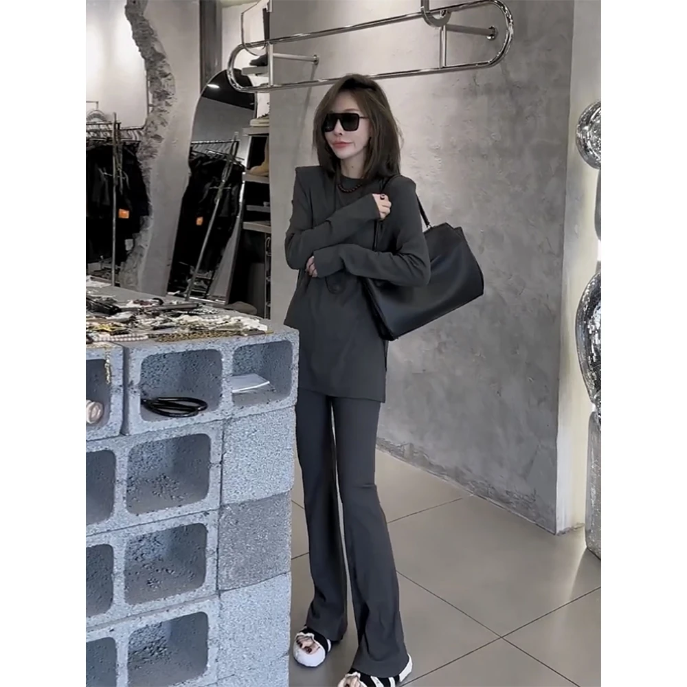 韩版时髦时尚套装女2026春季新款开叉下摆长袖T恤微喇长裤两件套