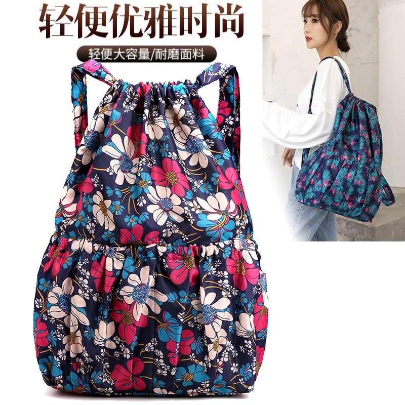 女士背包时尚印花休闲双肩包大容量牛津布包中年妈妈包束口袋8090