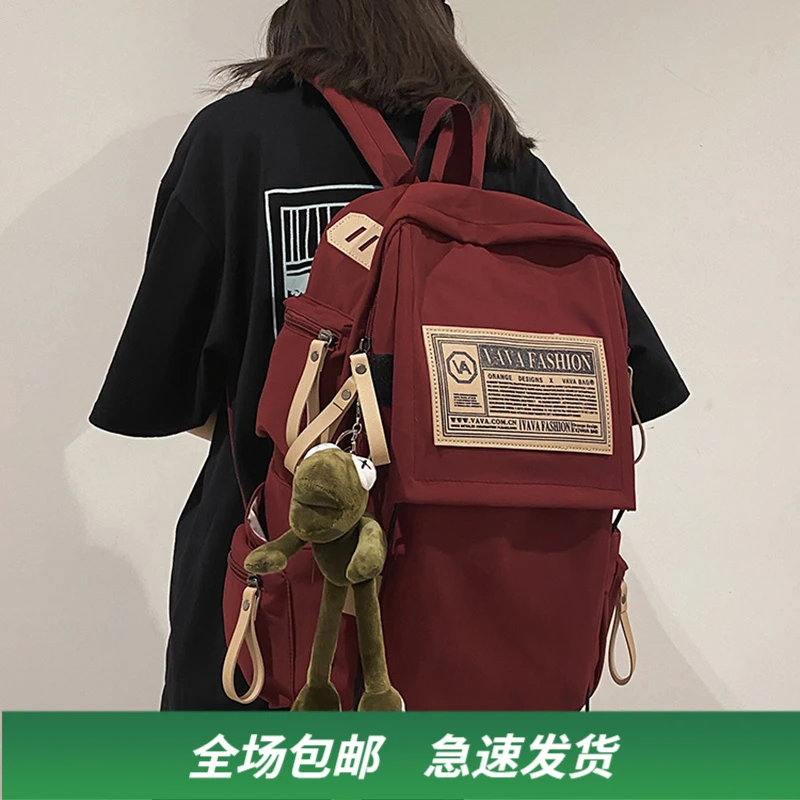 Viney双肩包女潮流帆布2025款休闲简约学生书包大容量多功能背包