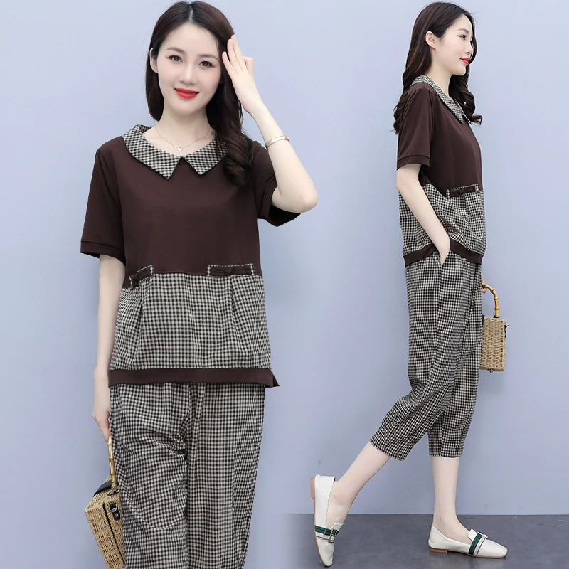 大码减龄时尚套装女2025年短袖宽松显瘦夏季大码女士百褶裙两件套