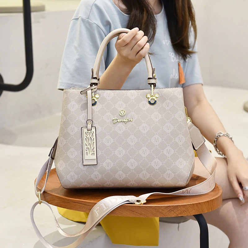 【FIDM品牌女包】2025新款网红爆款双层口袋手提单肩斜挎女包复古风