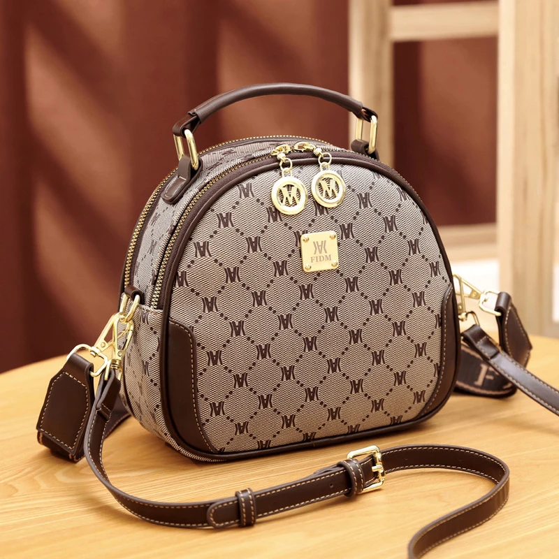 【FIDM品牌女包】2023新款时尚印花简约单肩斜挎包个性手提小圆包