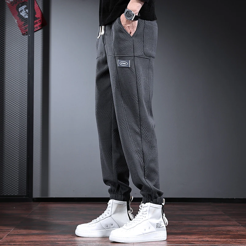 春秋季重磅休闲裤男潮牌宽松束脚裤民族中国风卫裤提花大码男裤子