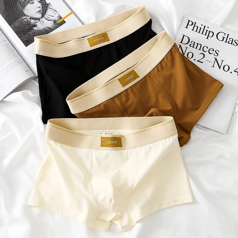 新款纯色男士内裤宽松男平角裤透气棉潮中腰大码四角裤青年个性
