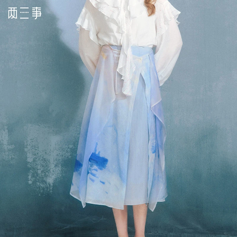 两三事湿露像素2024夏季新款复古油画印花布拼接A字半身裙长裙