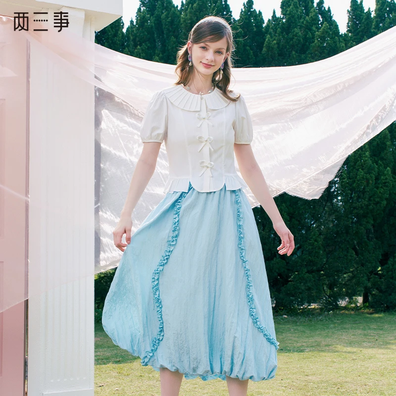 两三事似水流年2024夏季新款温柔风木耳边抽绳裙摆高腰半身裙长裙