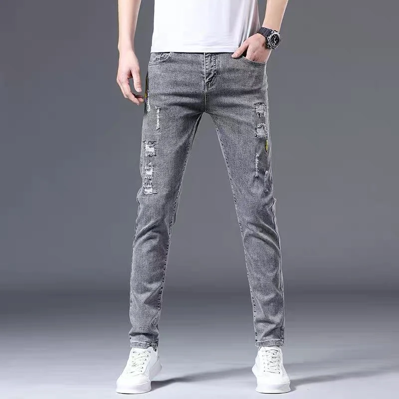 春秋新款牛仔裤男士韩版修身小脚裤子男弹力潮流休闲百搭破洞长裤