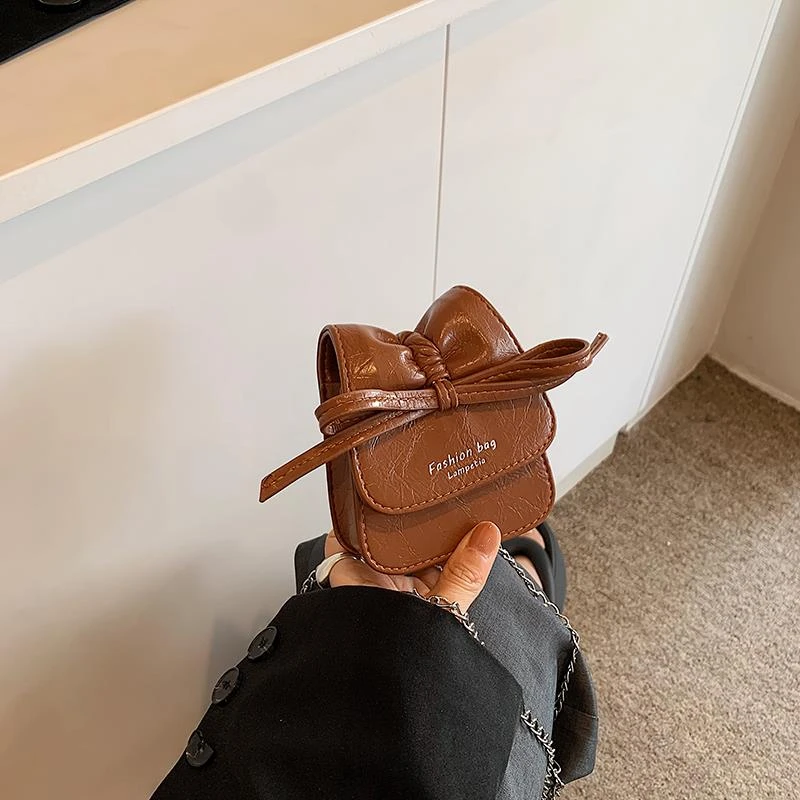 网红洋气儿童包包时尚女童宝宝蝴蝶结零钱包女孩配饰单肩斜挎包