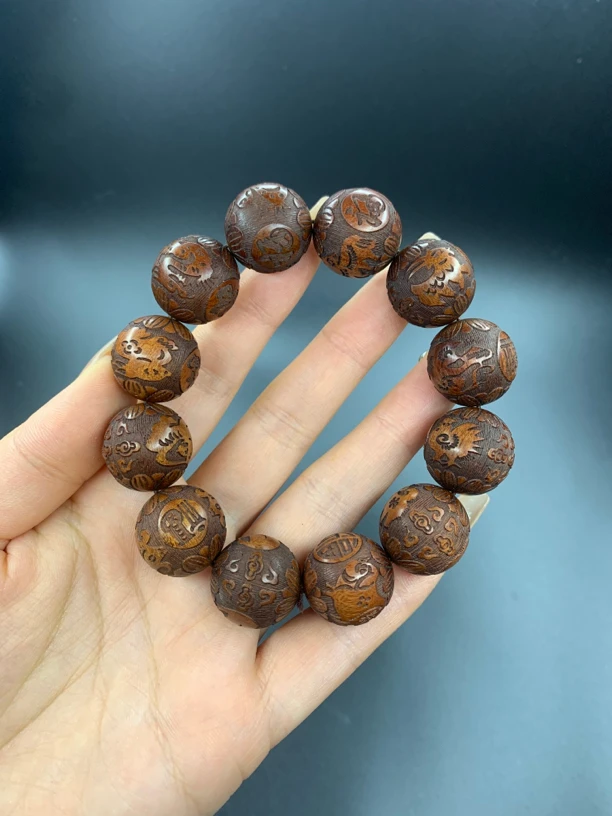 黄花梨雕刻12生肖手串
