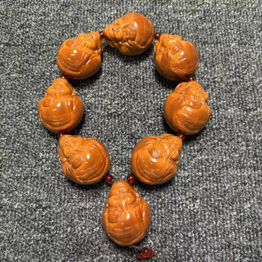 天然印尼大橄榄核雕刻 3.3左右光背小财神 8颗 手持