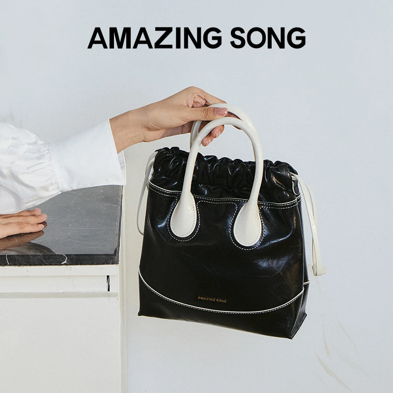 AMAZINGSONG熊猫撞色流浪袋百搭单肩斜挎潮流包包时尚轻奢