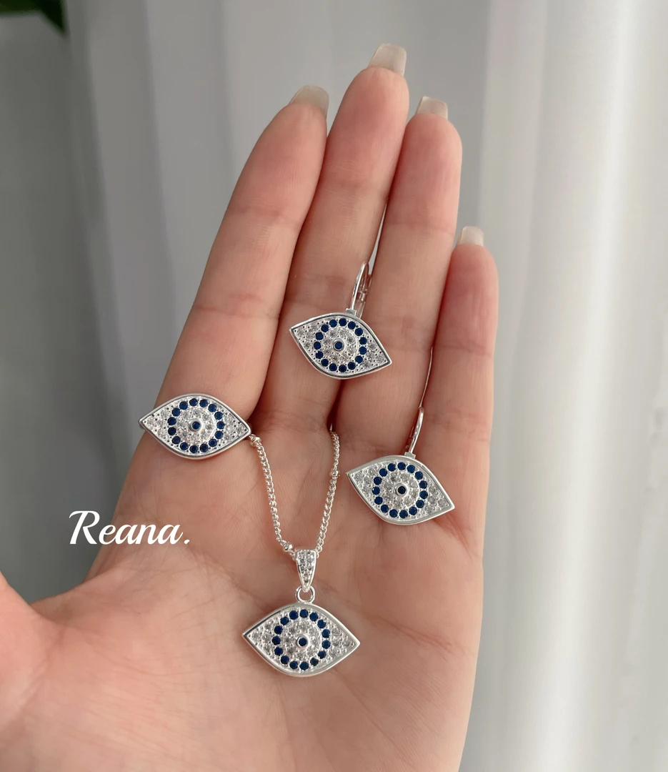 铜合金合成锆石耳饰 蕊娜微镶满钻钻蓝眼睛耳拍