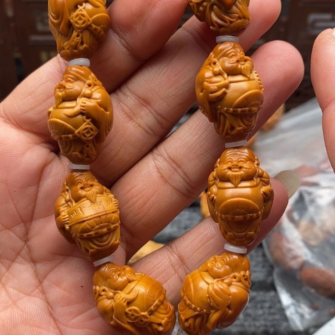 橄榄核核雕都我的