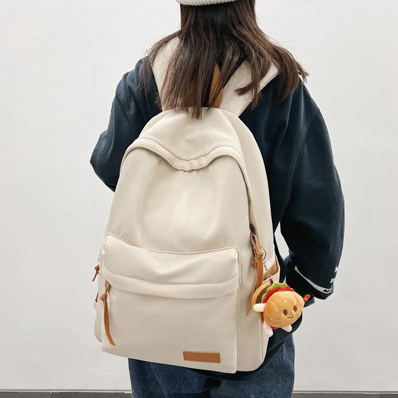 双肩包女休闲大容量纯色简单旅行背包轻便高中生书包大学生旅游包