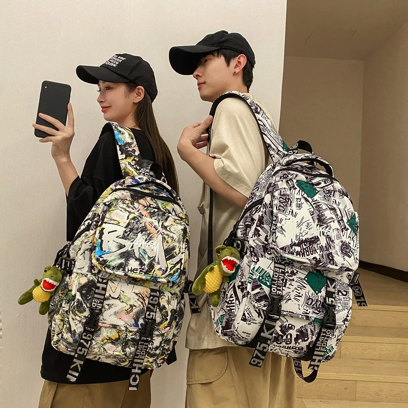 迷彩印花色书包推荐背包女双肩包初中高中生小学双肩背男潮流个性