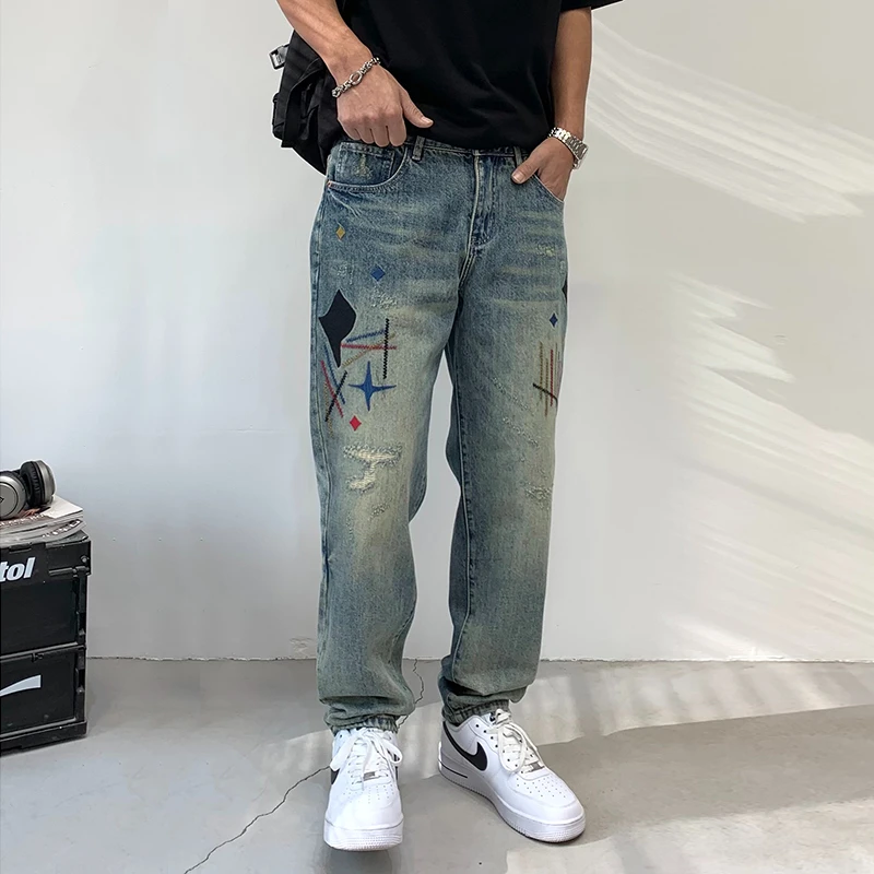 美式重工刺绣直筒牛仔裤男高街潮牌复古宽松印花百搭长裤潮流破洞