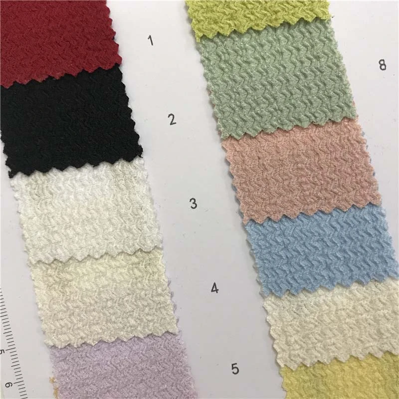 180g三角皱针织面料22个颜色现货供应厂家直销时尚套装面料374697