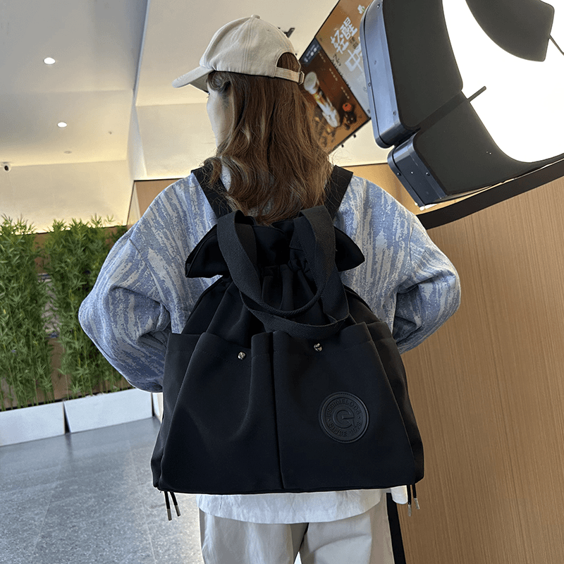 轻便双肩包女新款2024抽绳束口袋旅行包大学生书包ins休闲背包
