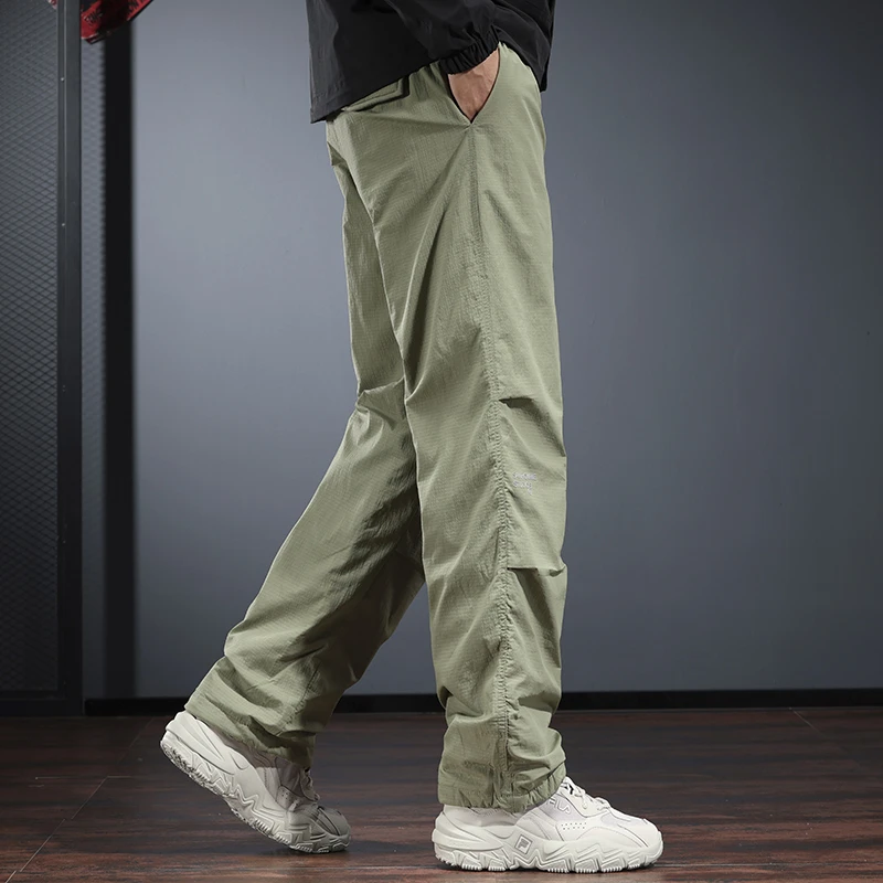 冬季羽绒裤男直筒宽松冲锋裤大码防风防水户外滑雪防寒保暖伞兵裤